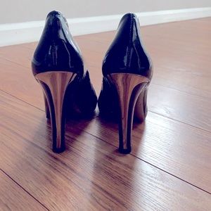 BCBG BLACK PATENT PUMPS